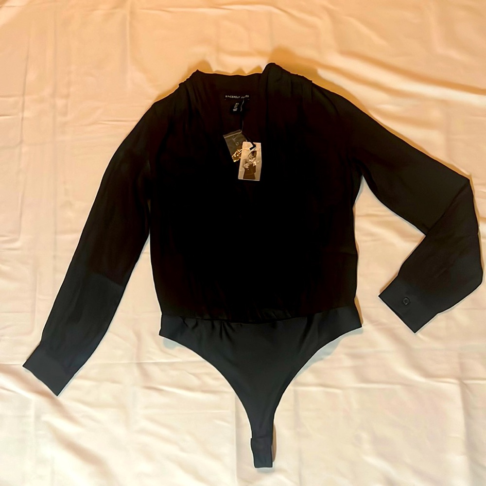 Black blouse.